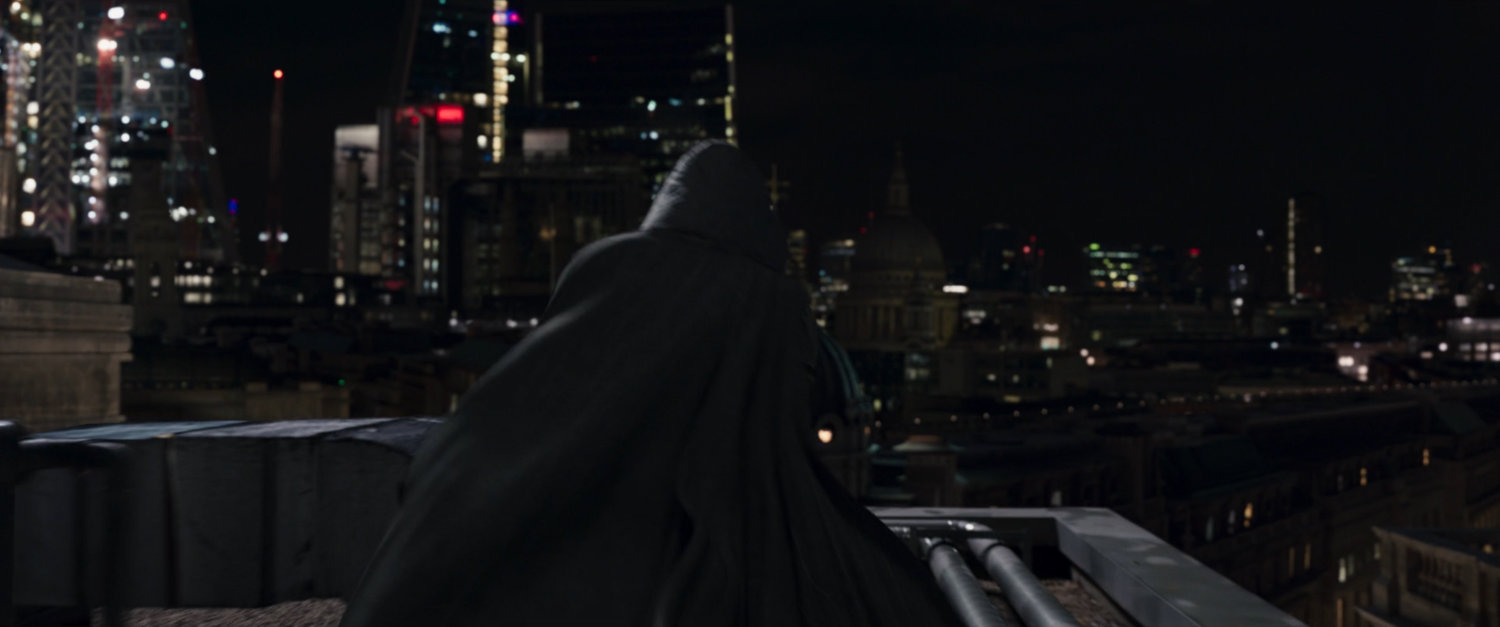 Moon Knight running across a dark London rooftop.