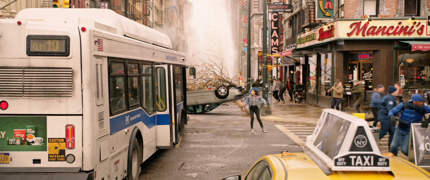 America Chavez in intersection in New York street.