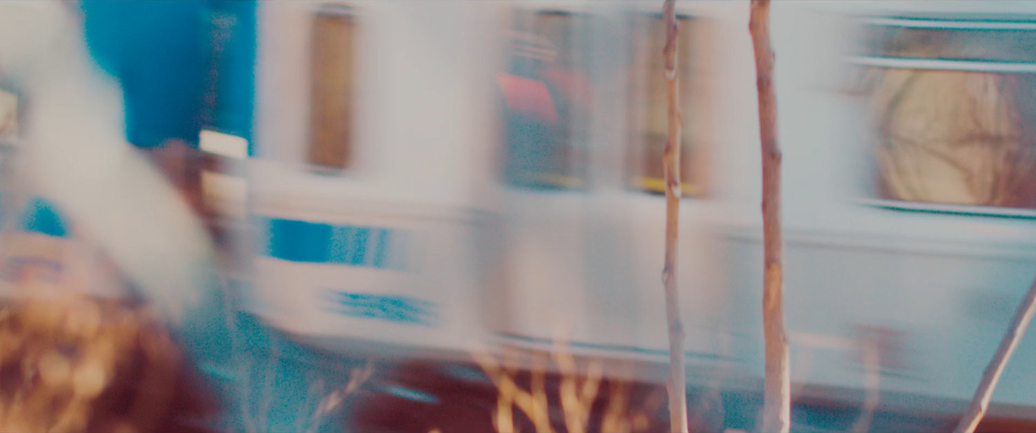 Ms Marvel end credit screen: Blurry Train through Chain Link Fence