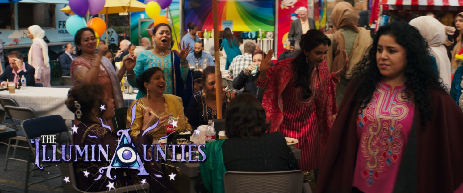 The IlluminAunties laughing at the Eid Mubarak Fair.