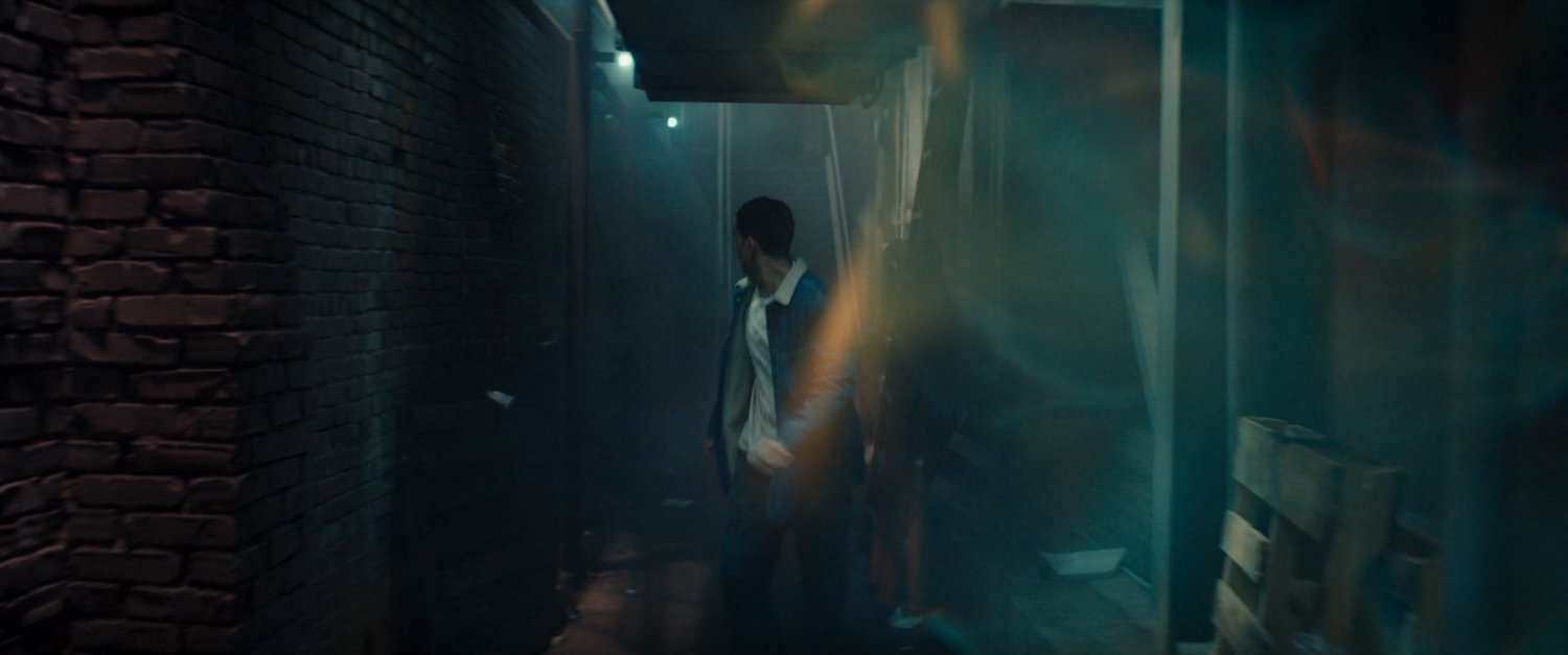 Kamran in alleyway.