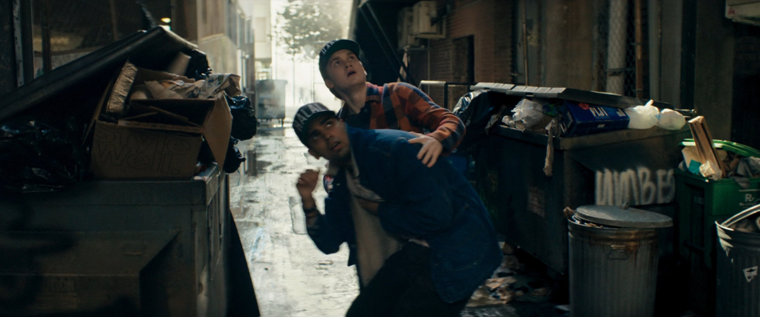 Bruno and Kamran in an alley.