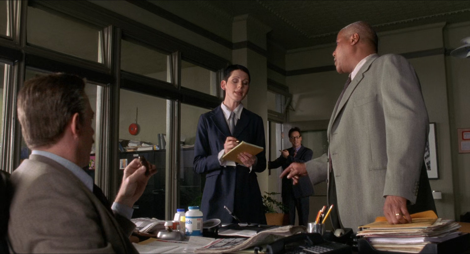 J Jonah Jameson and staff inside Daily Bugle offices.