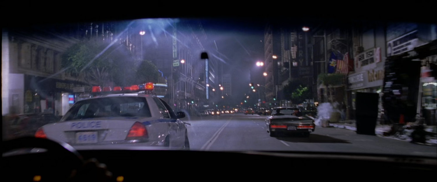 NYPD police car chases robbers.