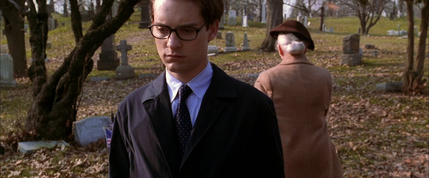 Peter and May Parker in cemetery.