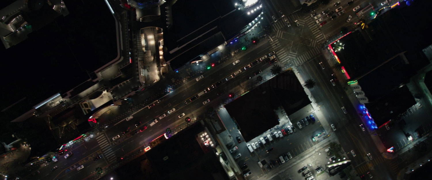 Night time aerial shot looking down on Hollywood Blvd and N Highland Ave.