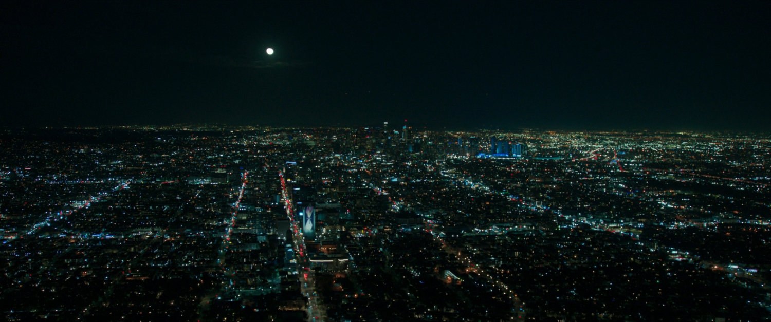 Aerial night shot of Los Angeles looking east from the Mid-Wilshire district.