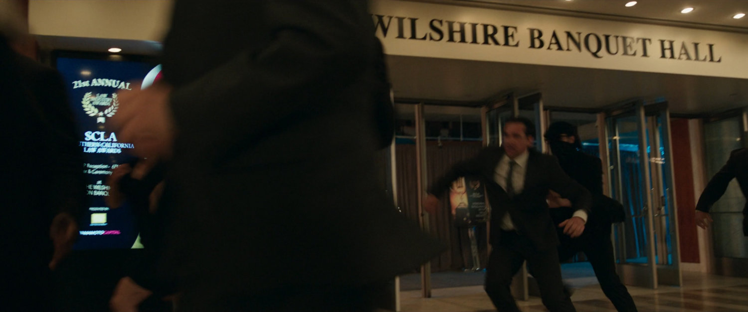 Panicked people leave the Wilshire Banquet Hall.