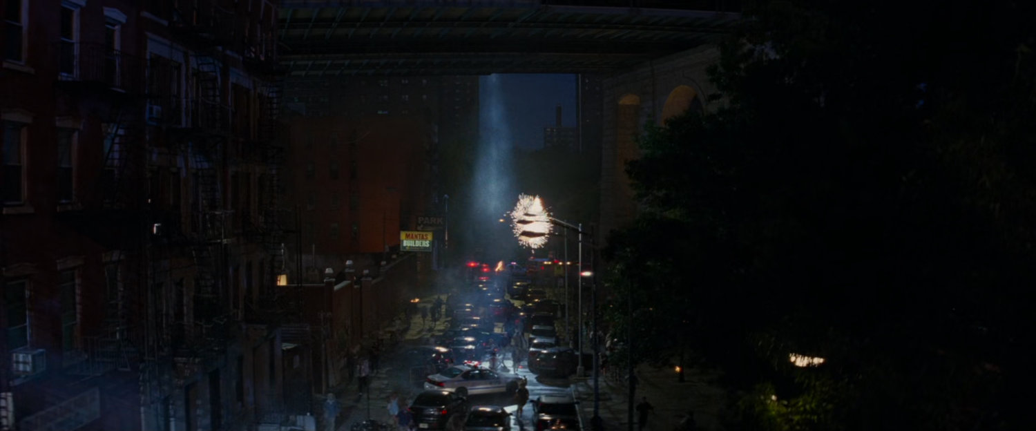Street lights explode over city street.