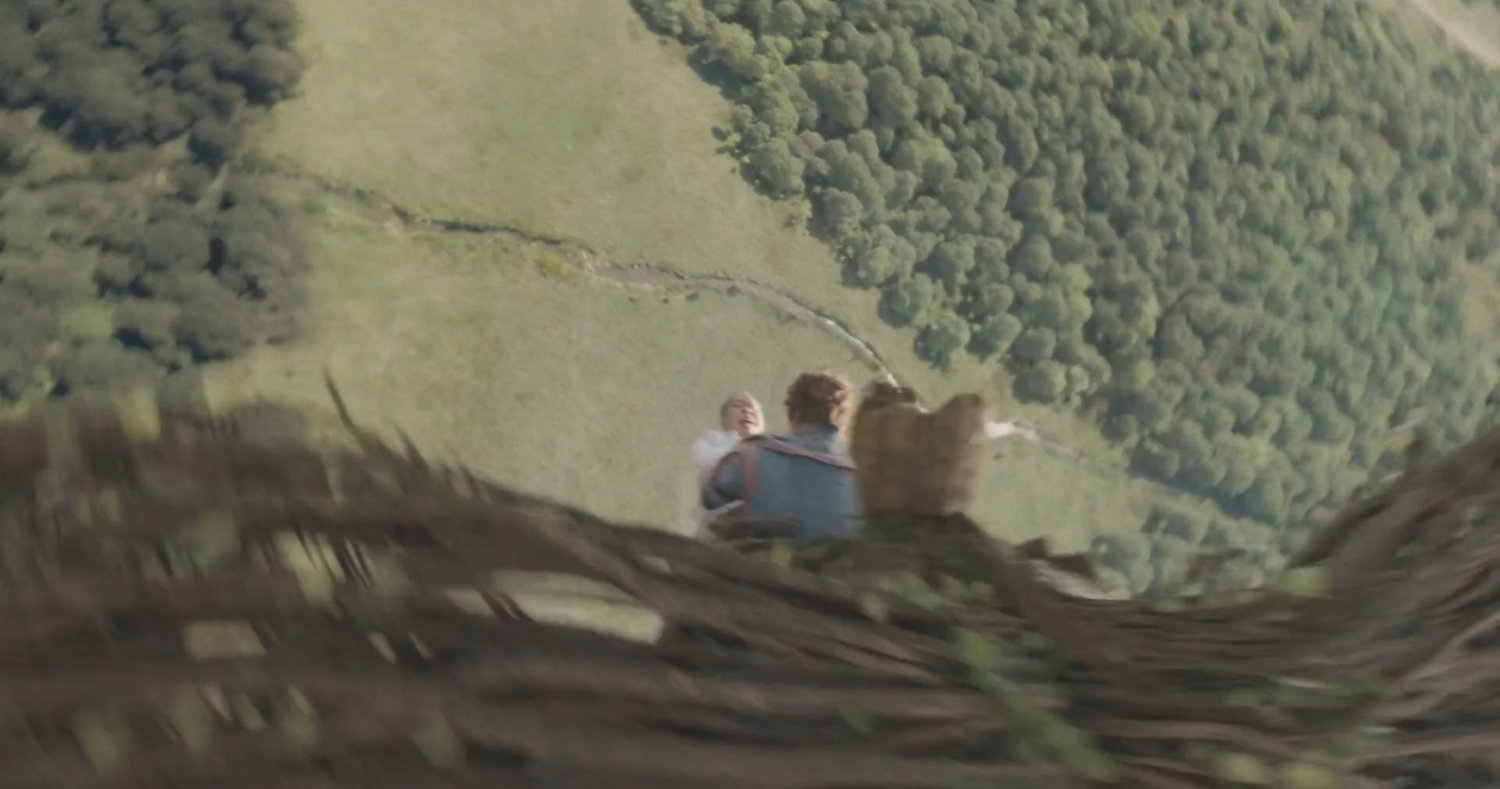 Aerial of Counter-Earth field with Groot and Star-Lord falling in the foreground.