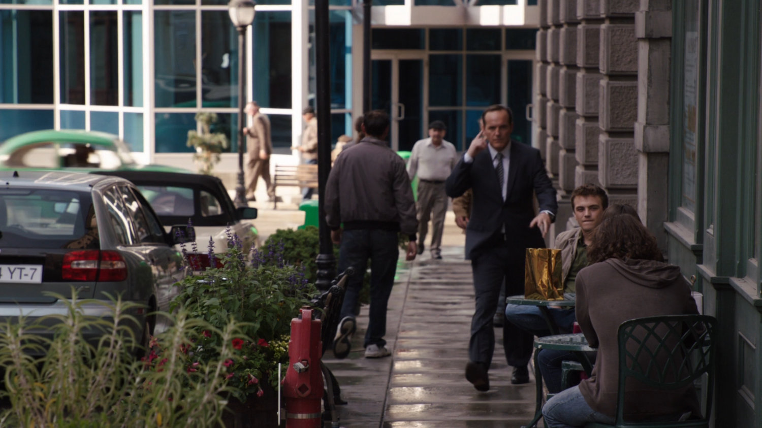 Coulson hurries across Victory Square.