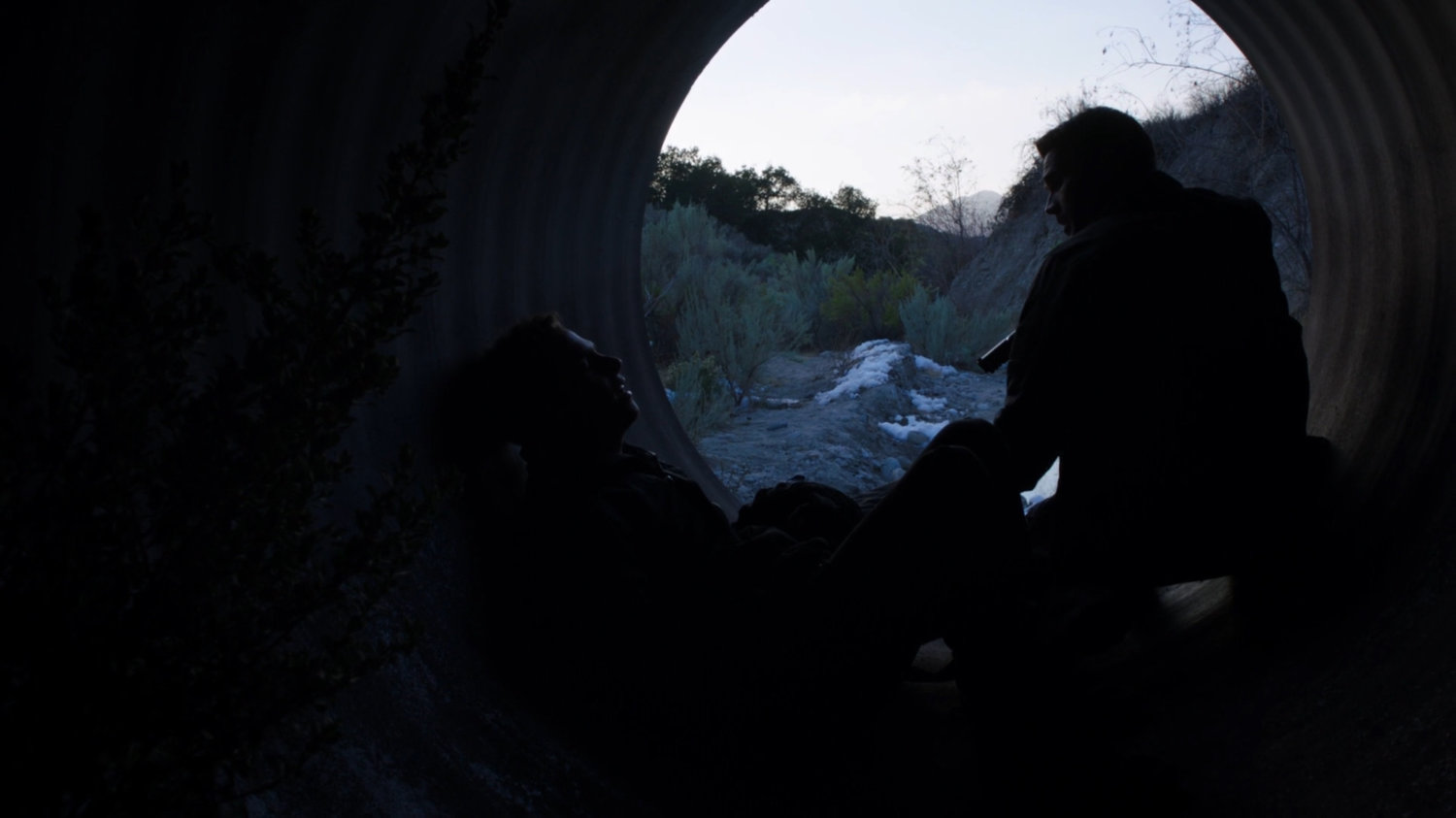 Ward and Fitz in a drainage pipe in the Caucasus Mountains.