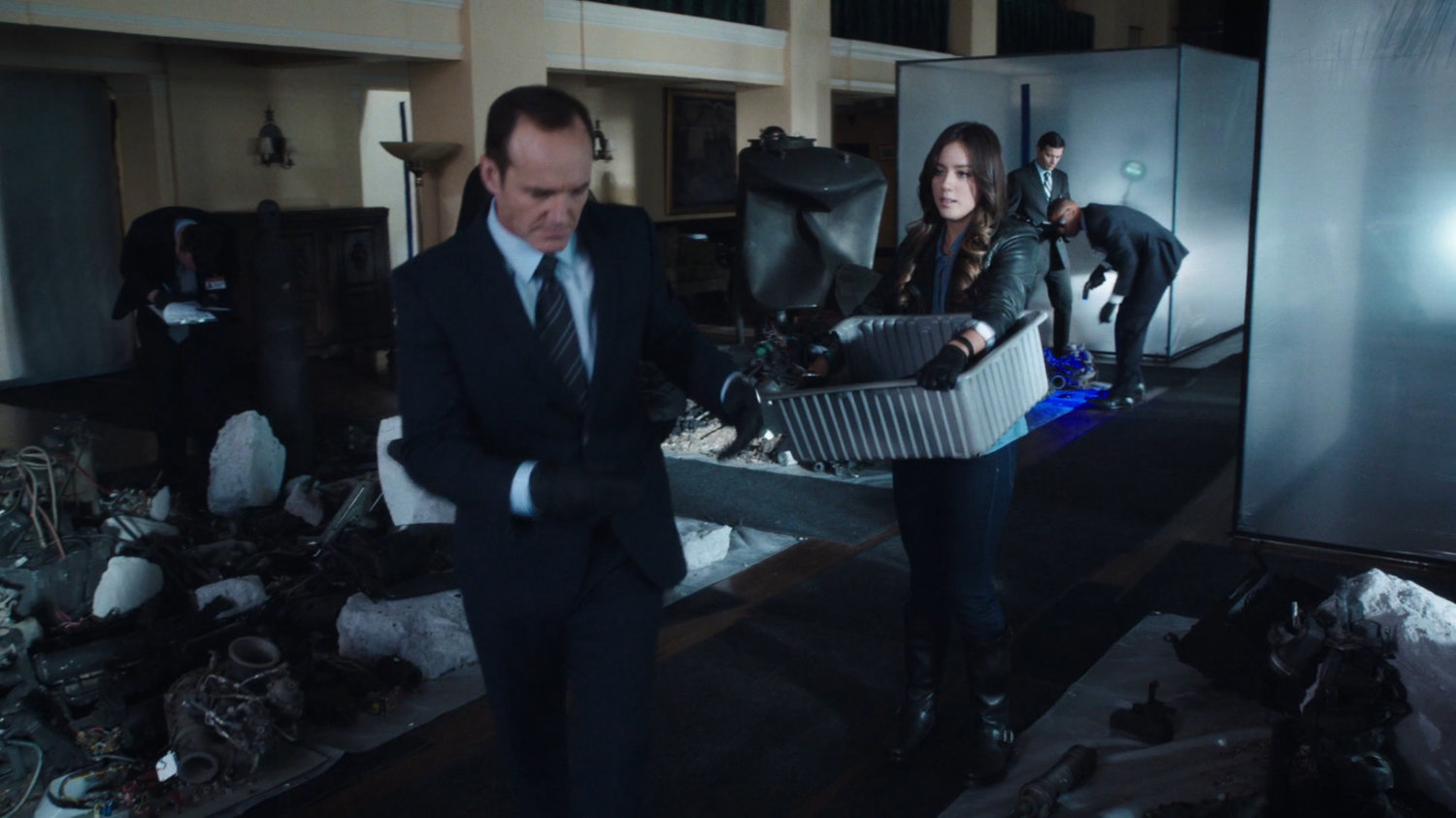 Coulson and Skye in a Greenwich University office.