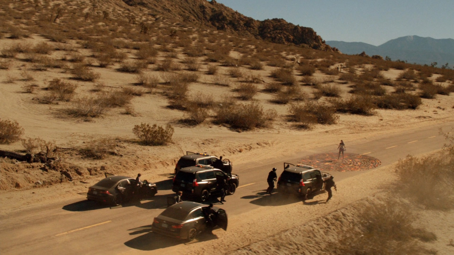 SHIELD Agents stop on a highway where SIF stands on top of an Asgardian sigil.