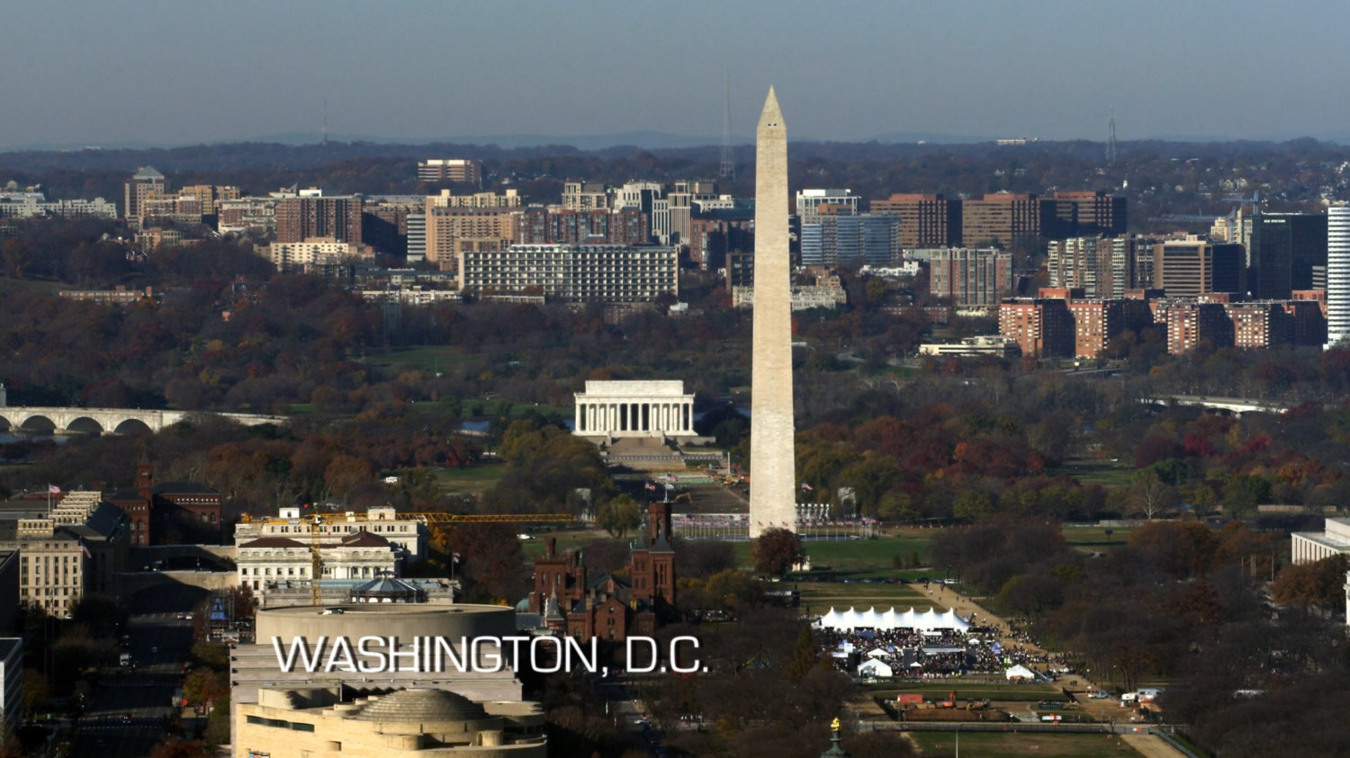 Establishing shot of Washington Monument from over the National Mall.