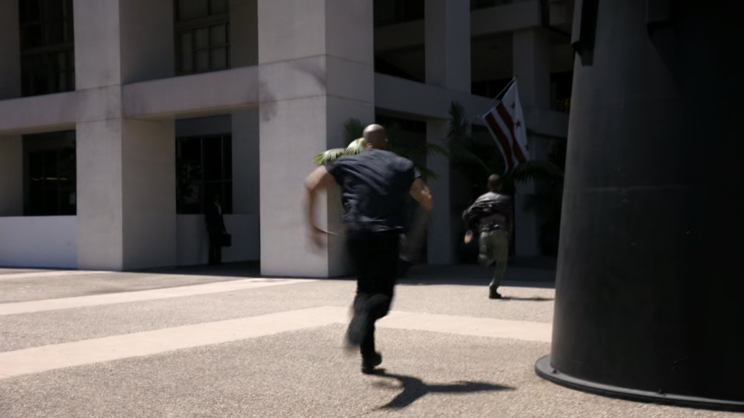 Creel chasing Hunter towards hotel.