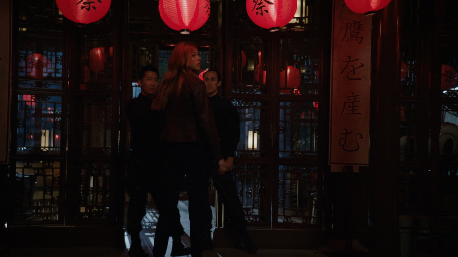 Bobbi enters Japanese pagoda.