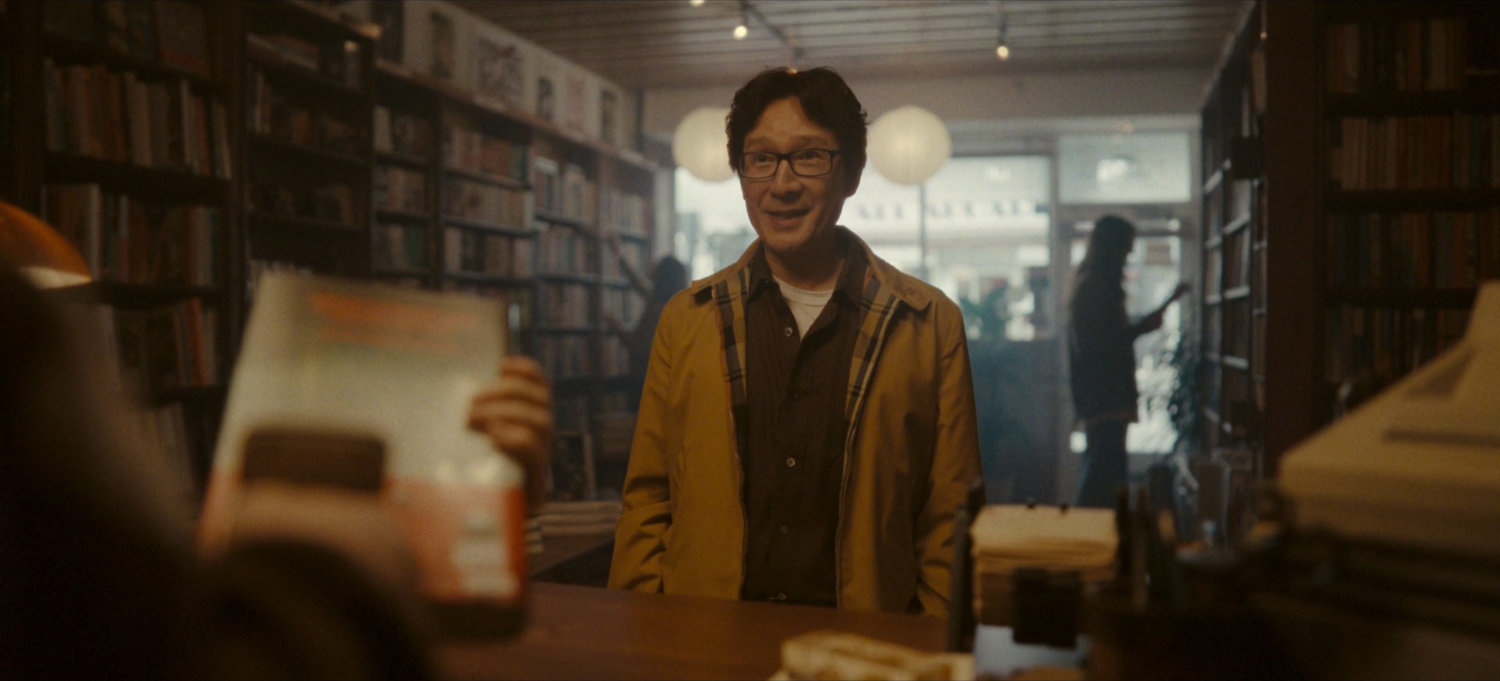 AD Doug standing in bookstore.