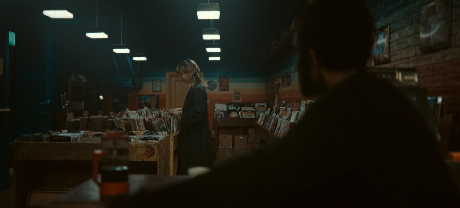 Sylvie in Broxton record store.