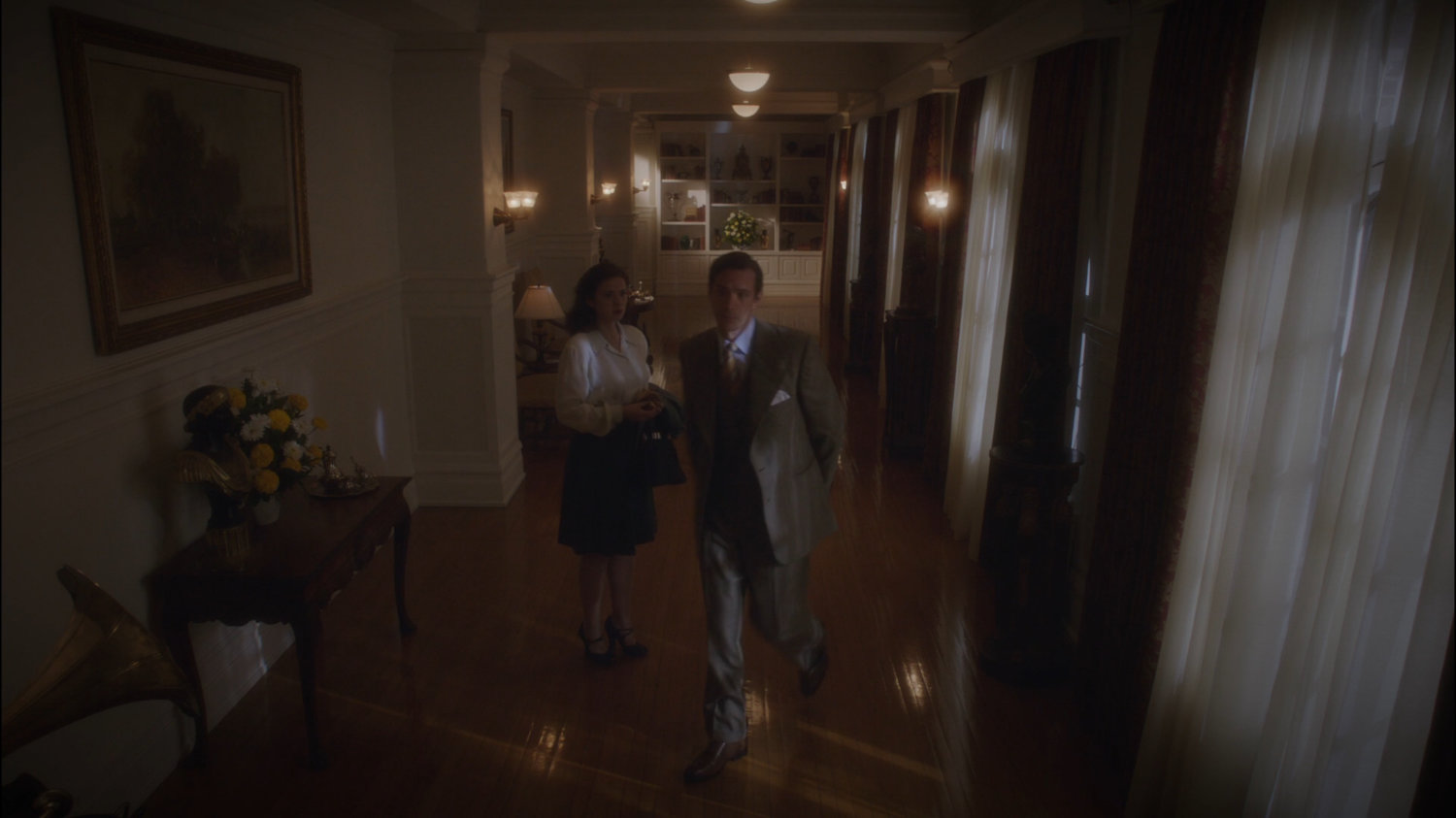 Peggy and Jarvis in hallway of Stark Penthouse.