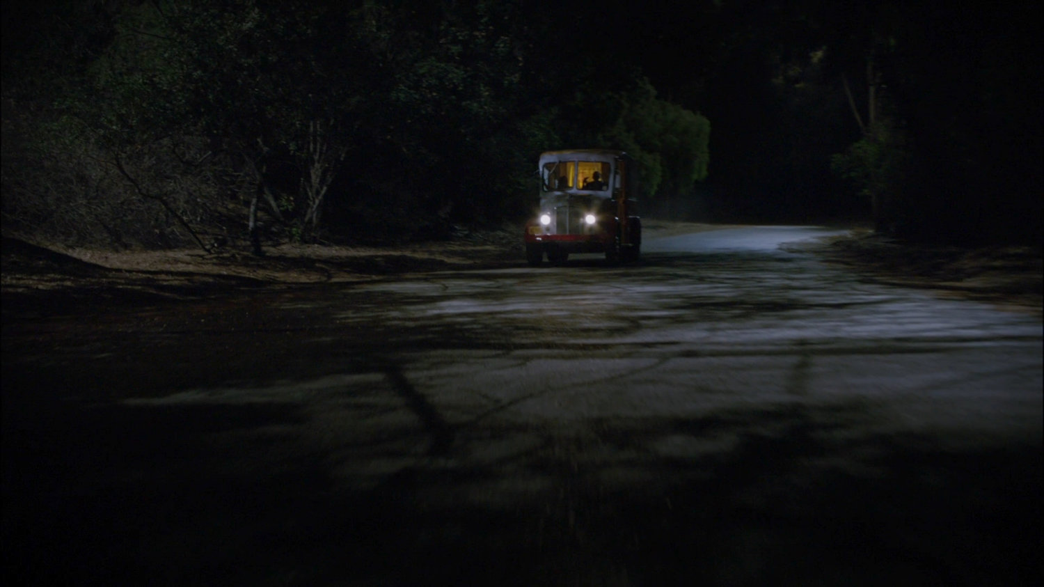 Milk truck on a dark, twisty New Jersey road.