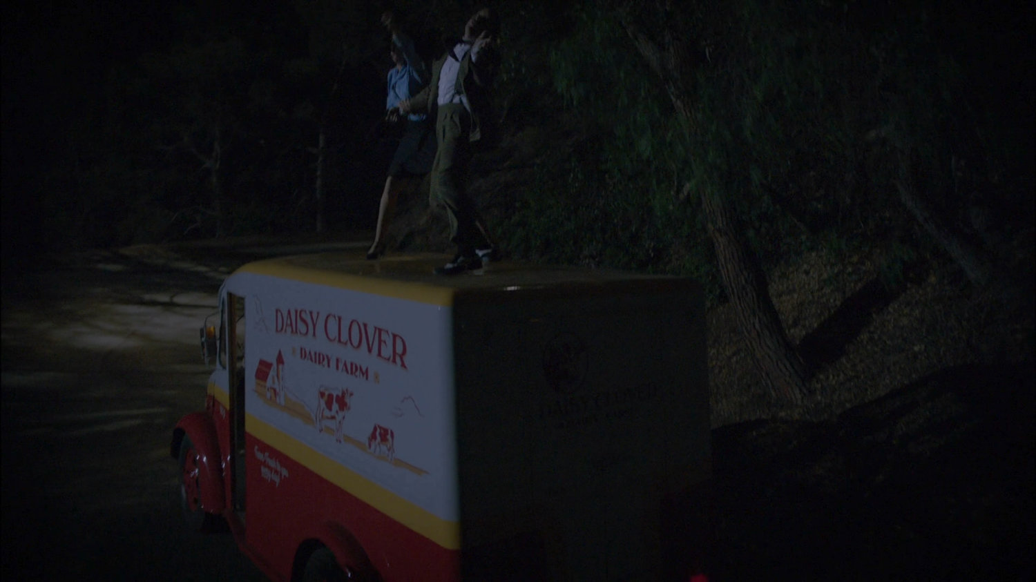 Fight on top of Daisy Clover truck on New Jersey road.