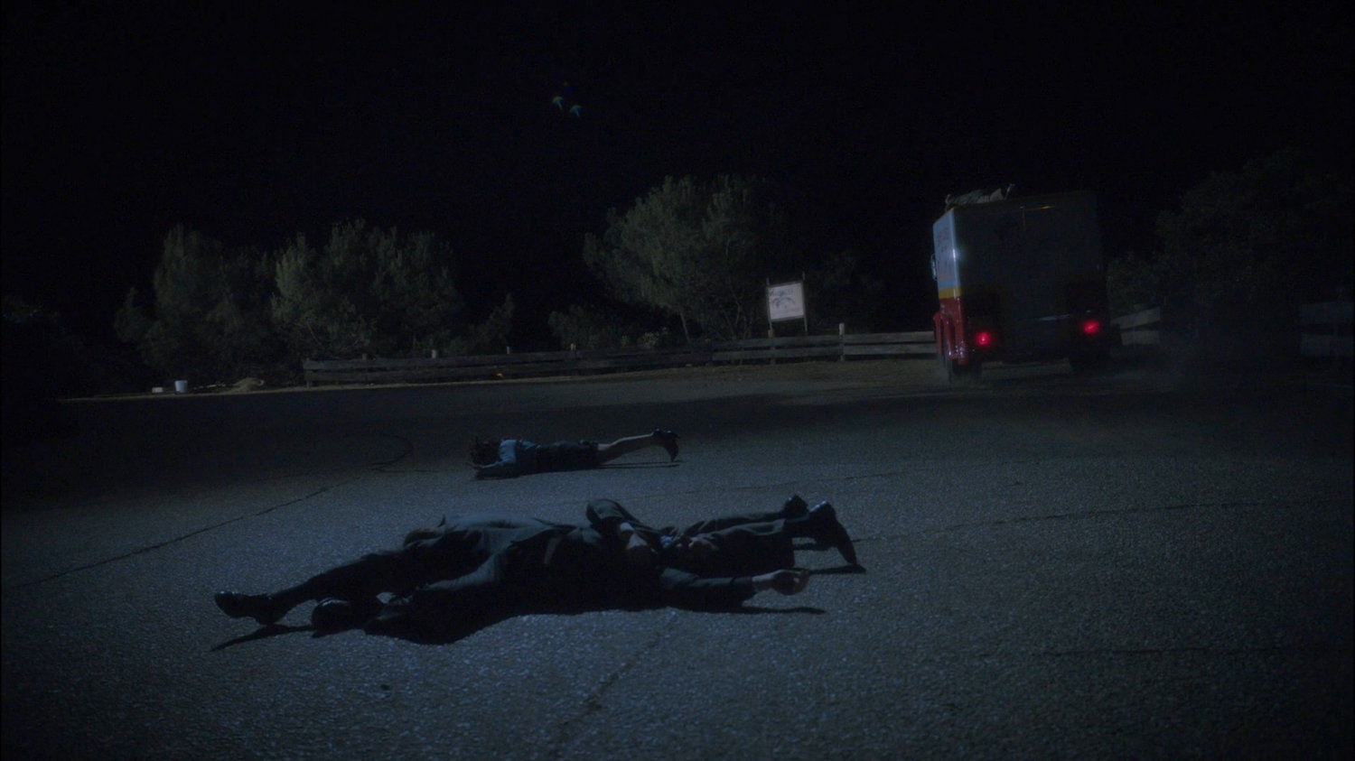 Bodies on road as Milk Truck goes over cliff.