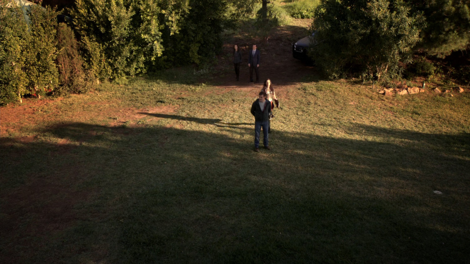 High angle of Sif and Vin-tak in a clearing.