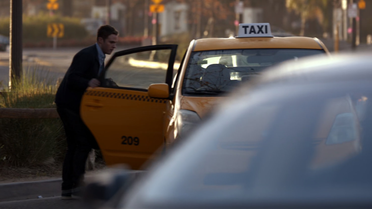 Fitz getting in cab on Delaware street.