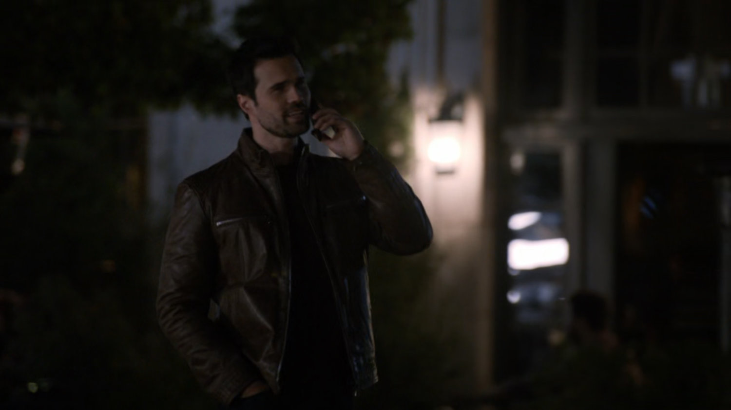Ward on a nighttime sidewalk.