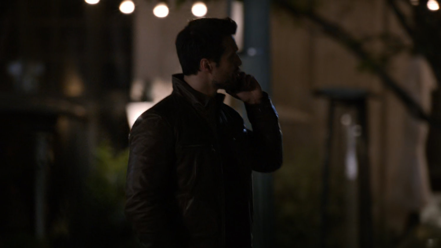 Ward on a nighttime sidewalk.