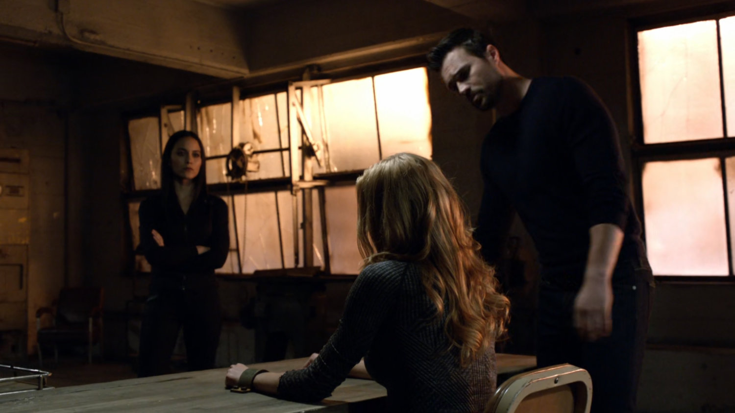 Ward and Agent 33 hold Bobbi hostage in an abandoned Spanish warehouse.