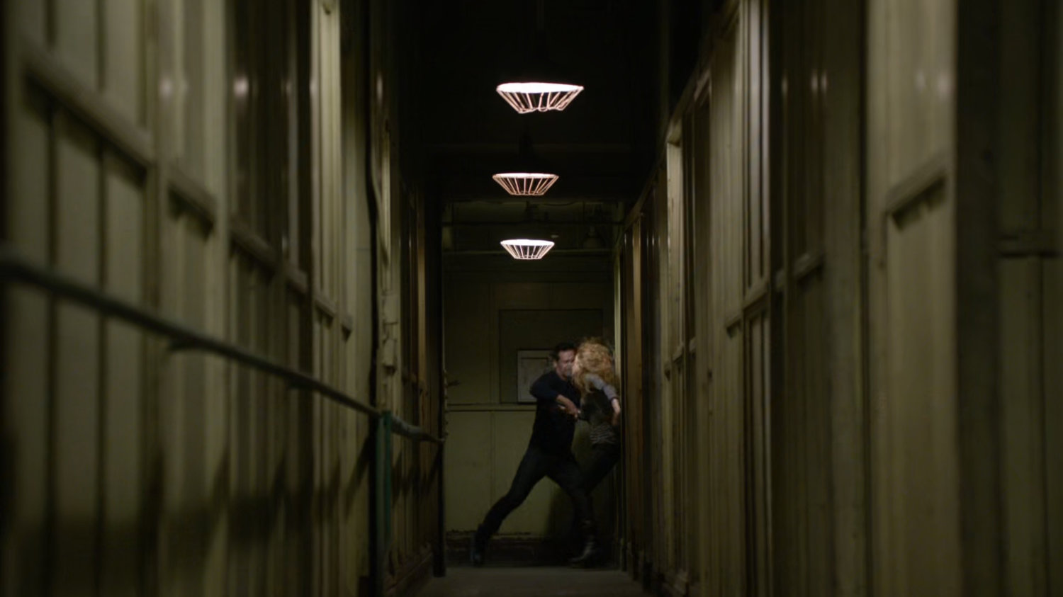 Bobbi and Ward fight in an abandoned Spanish warehouse.