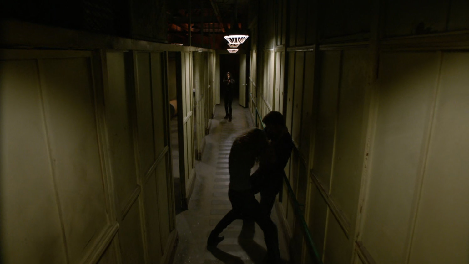 Bobbi and Ward fight in an abandoned Spanish warehouse.