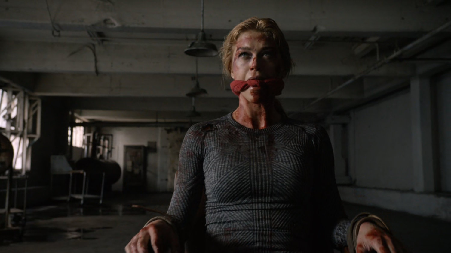 Bobbi bound and gagged inside an abandoned Spanish warehouse.