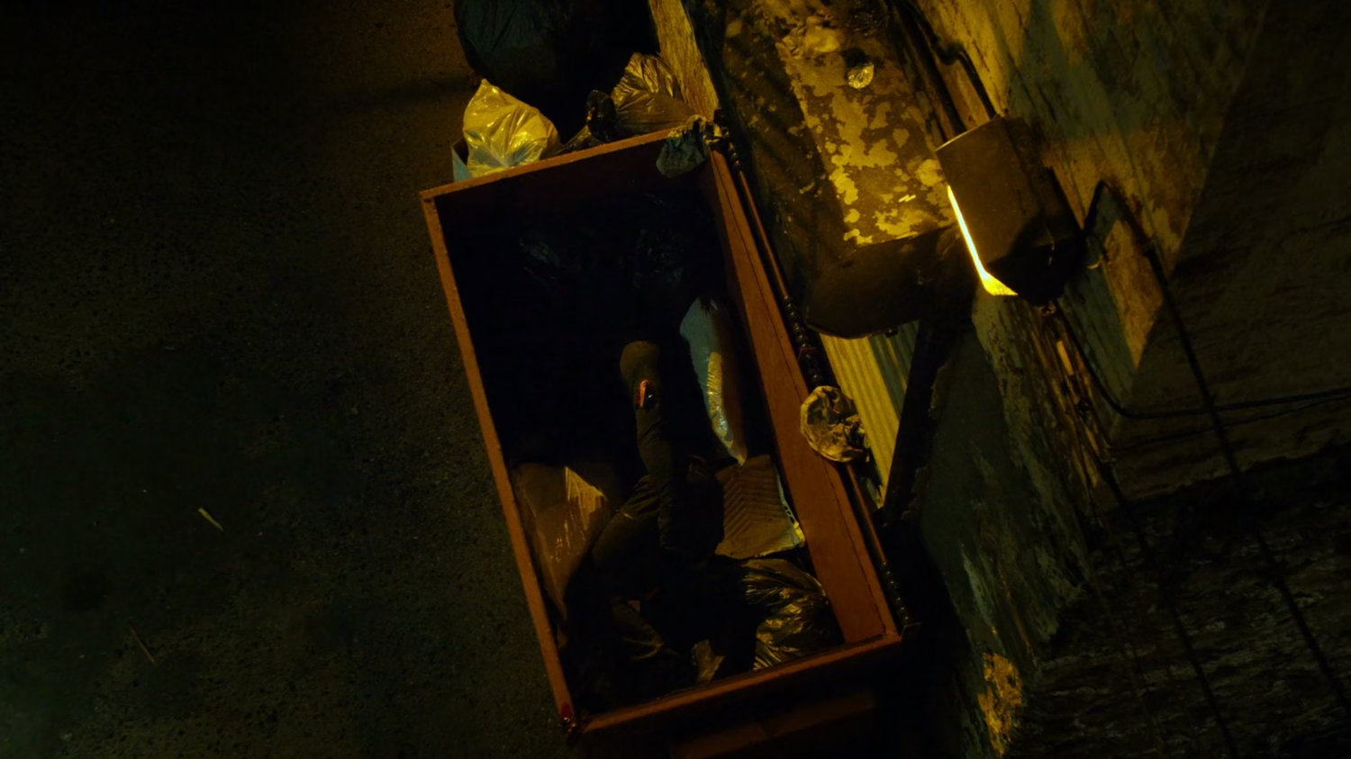 Body in a dumpster in Alley outside Claire's apartment.