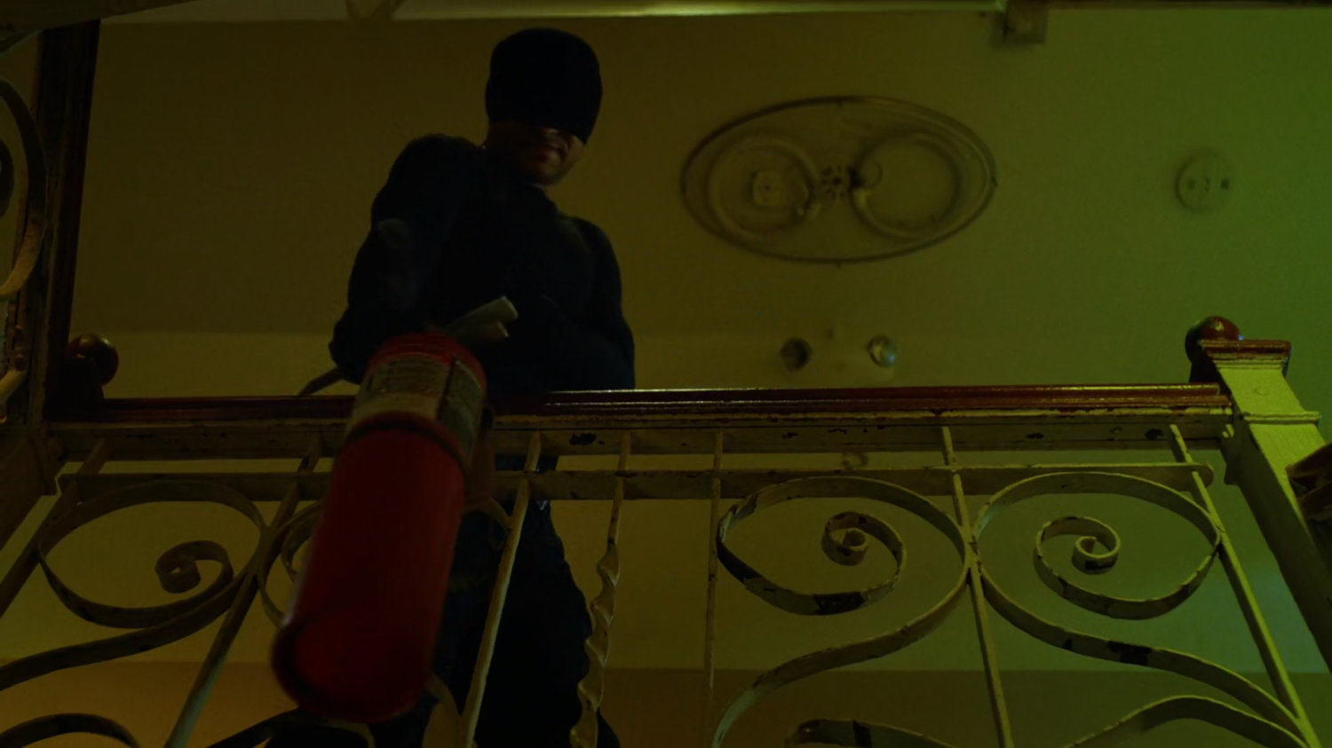 Matt in hall of Claire's apartment building.