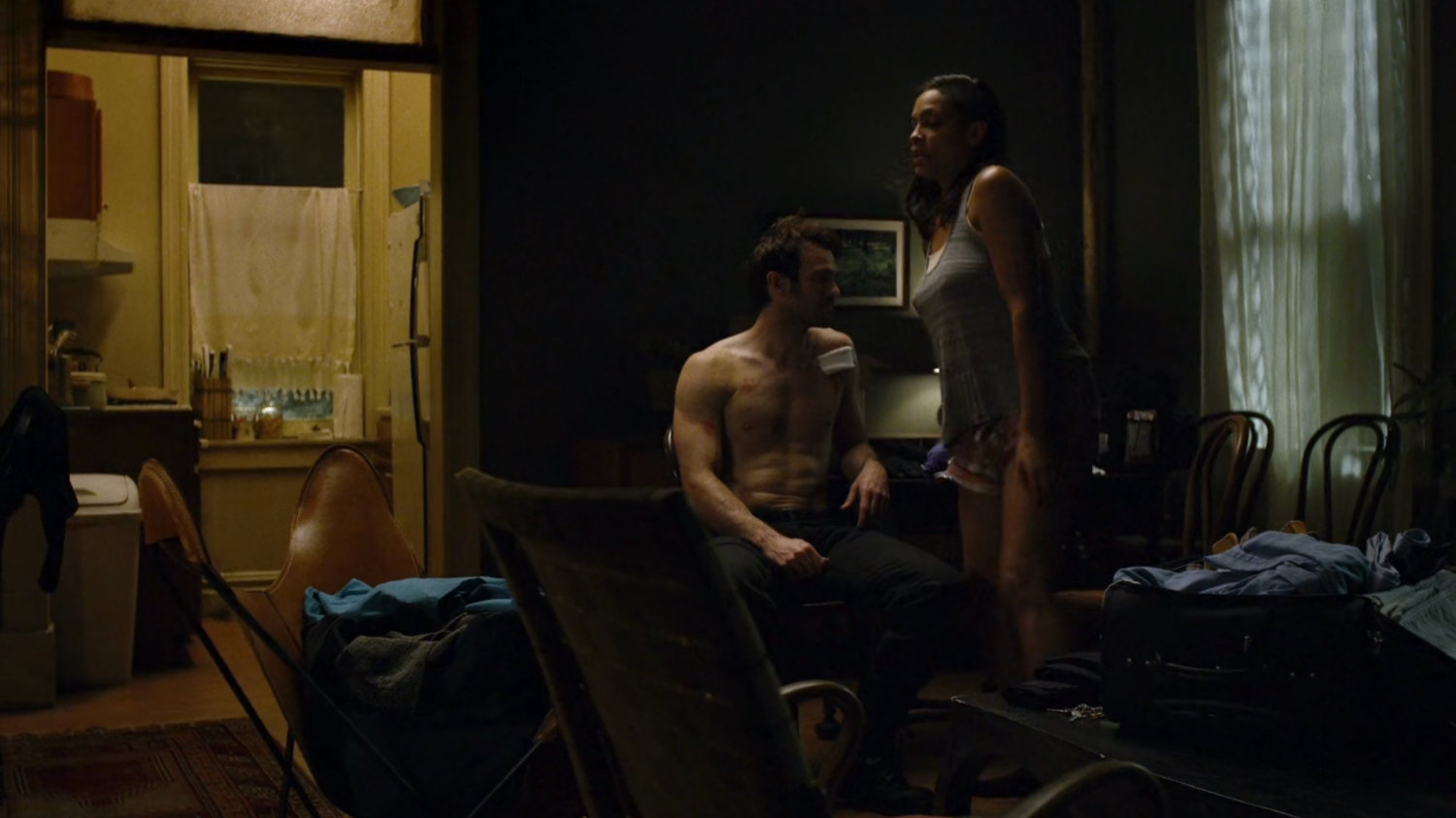 Matt and Claire in her co-worker's apartment.