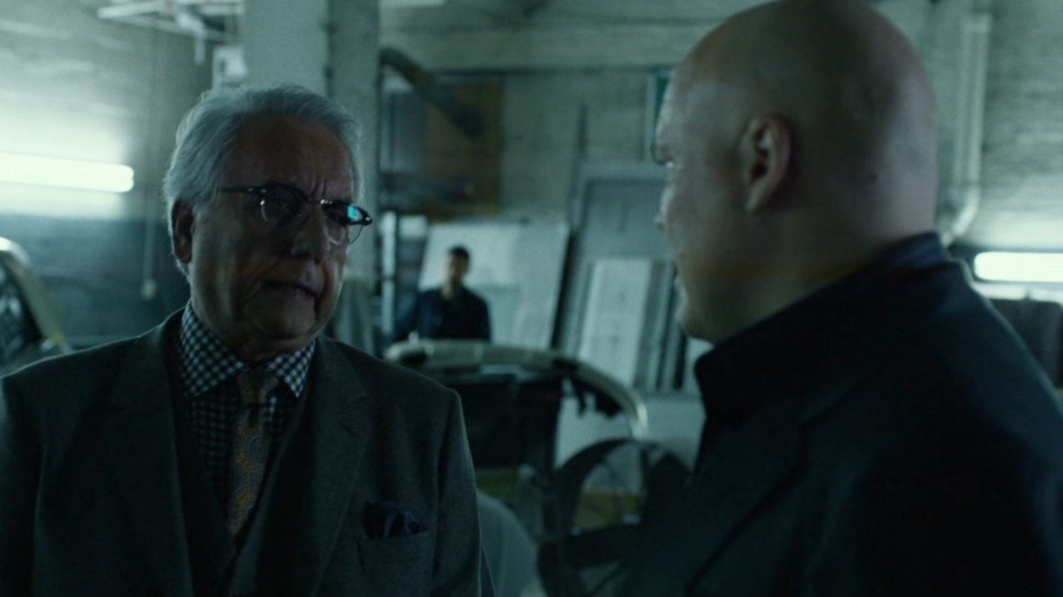 Fisk and Leland in body shop garage.