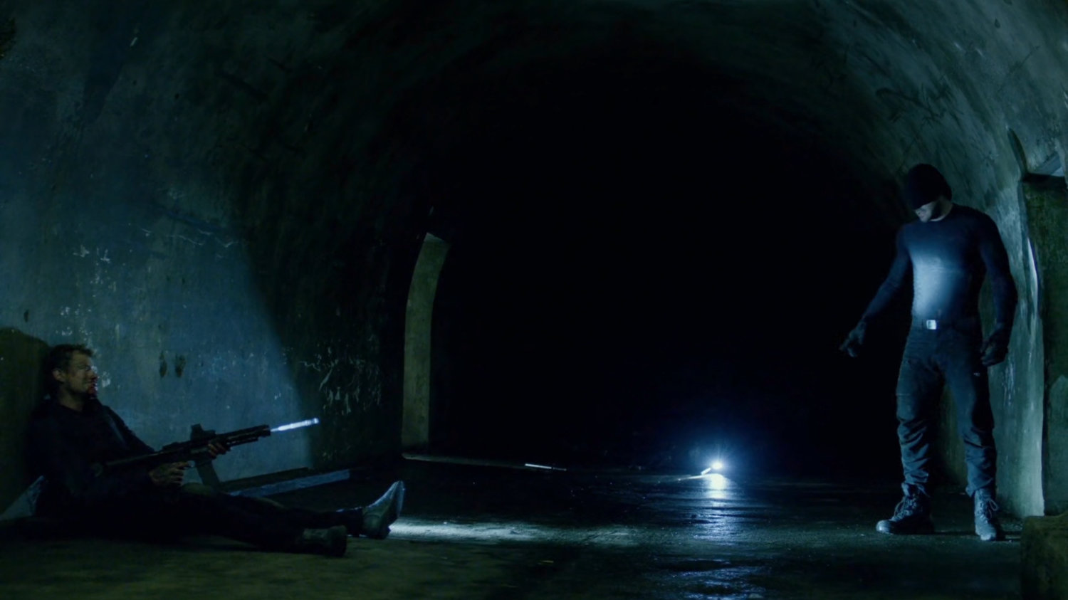 Daredevil and Vladimir in access tunnels under an abandoned warehouse.