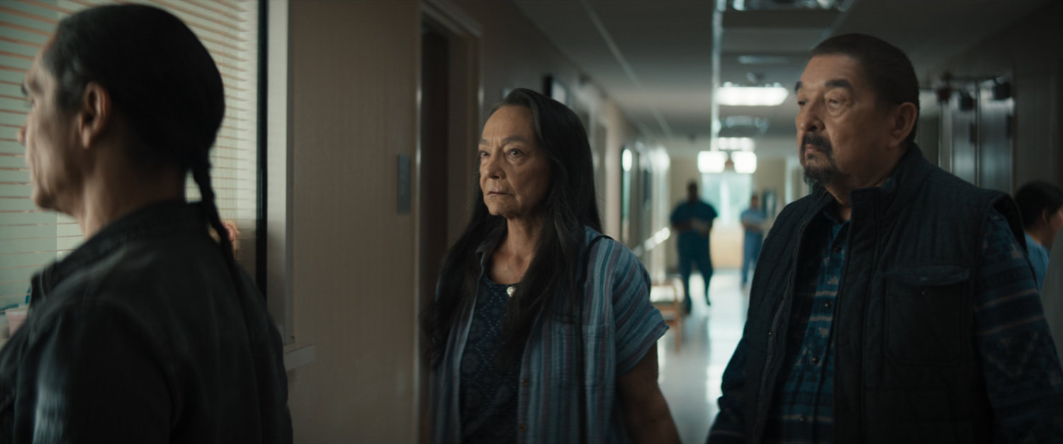 William, Chula, and Skully in a hospital hallway.