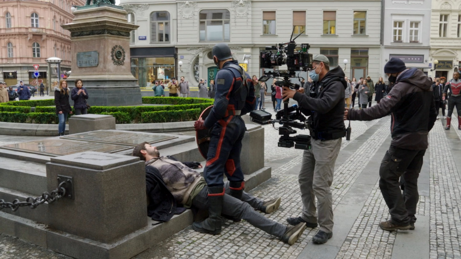 Behind the scene shot of John Walker in the courtyard.