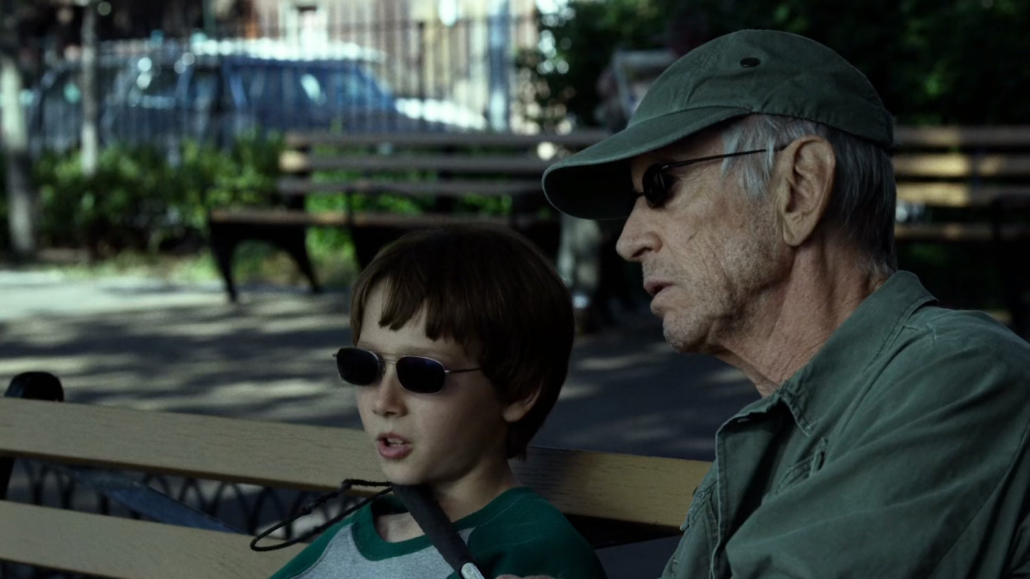 Stick and young Matt in a city park.