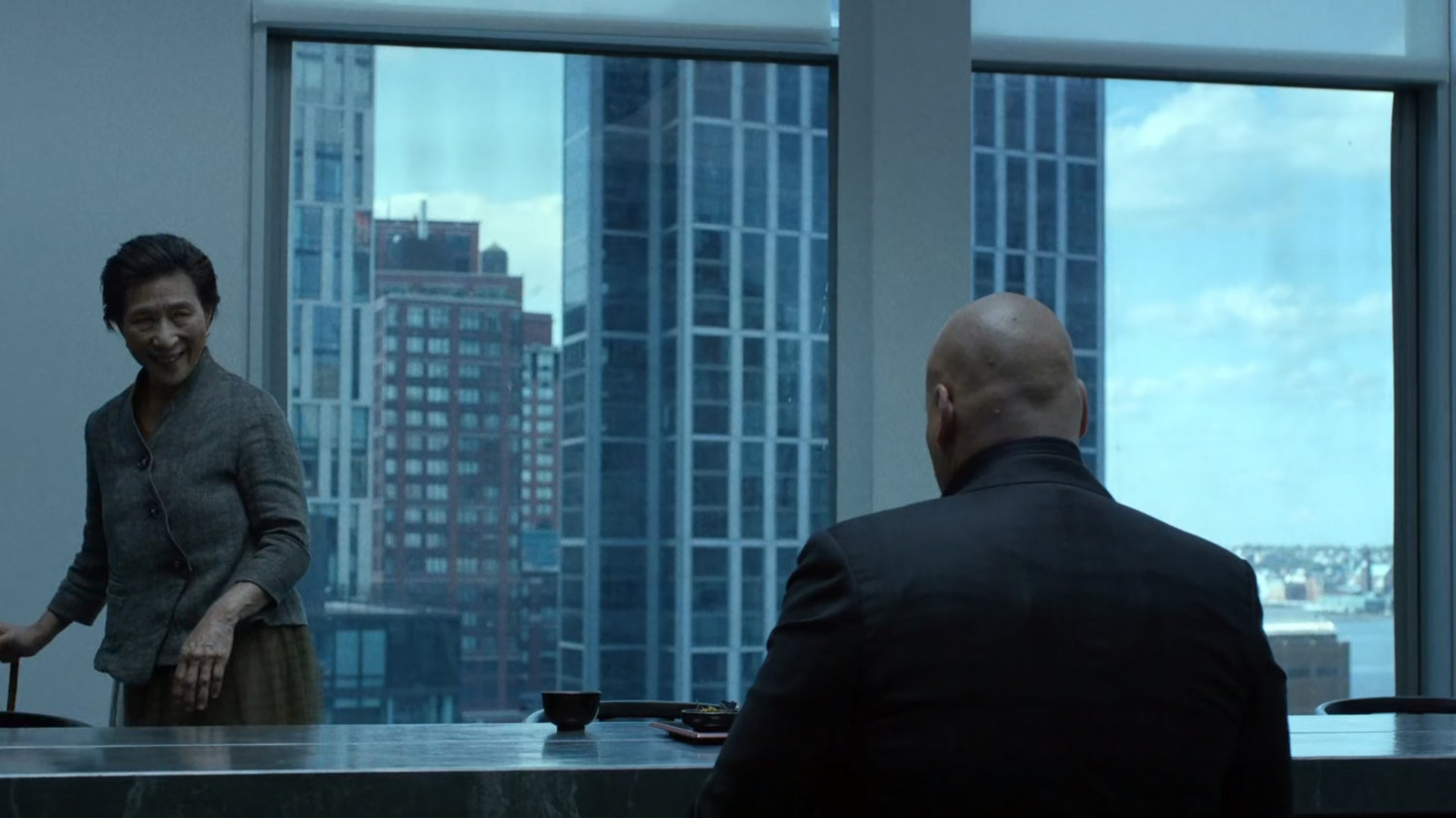 Madame Gao and Wilson Fisk inside his penthouse.