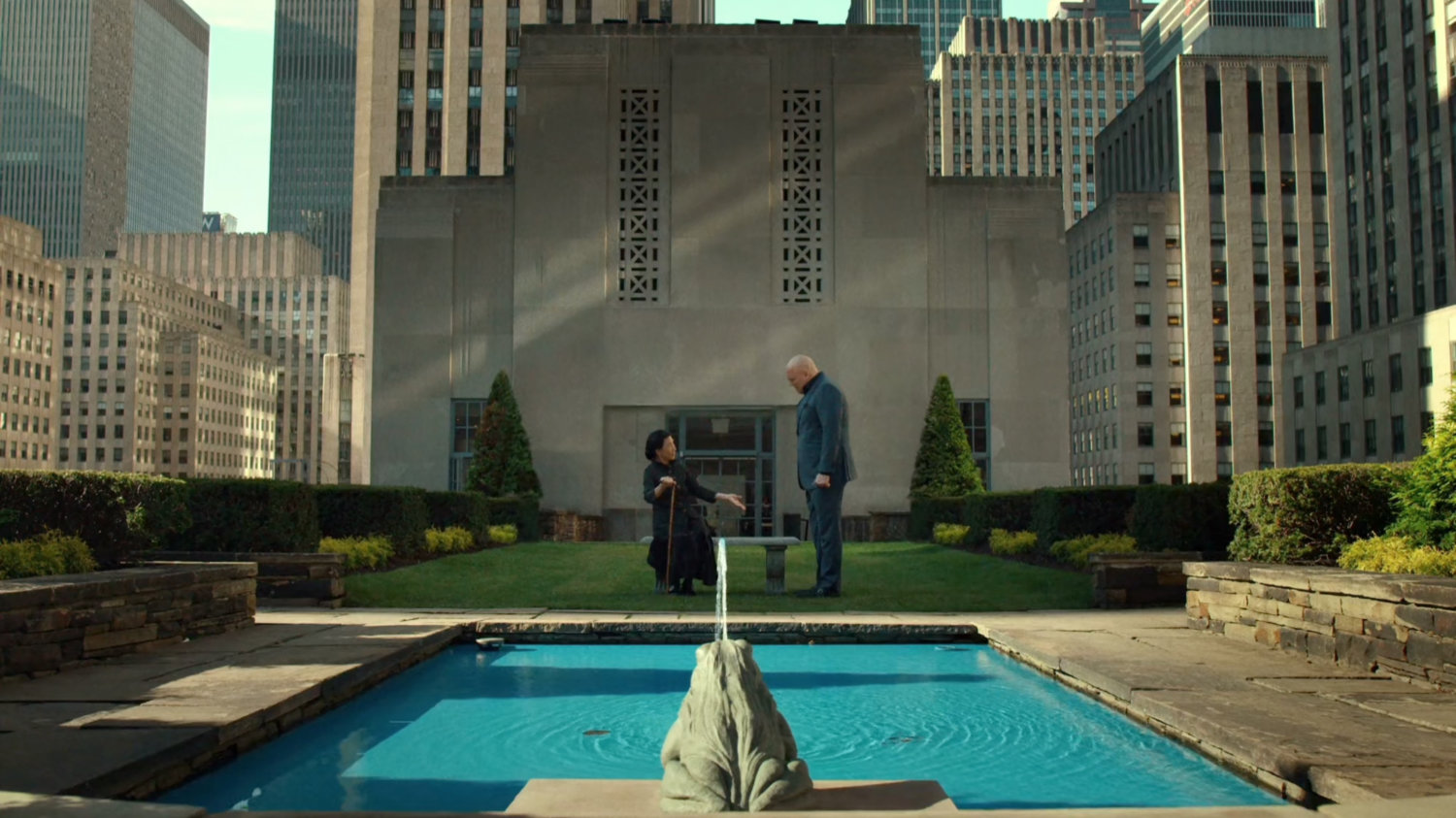 Fisk and Madame Gao on rooftop garden.