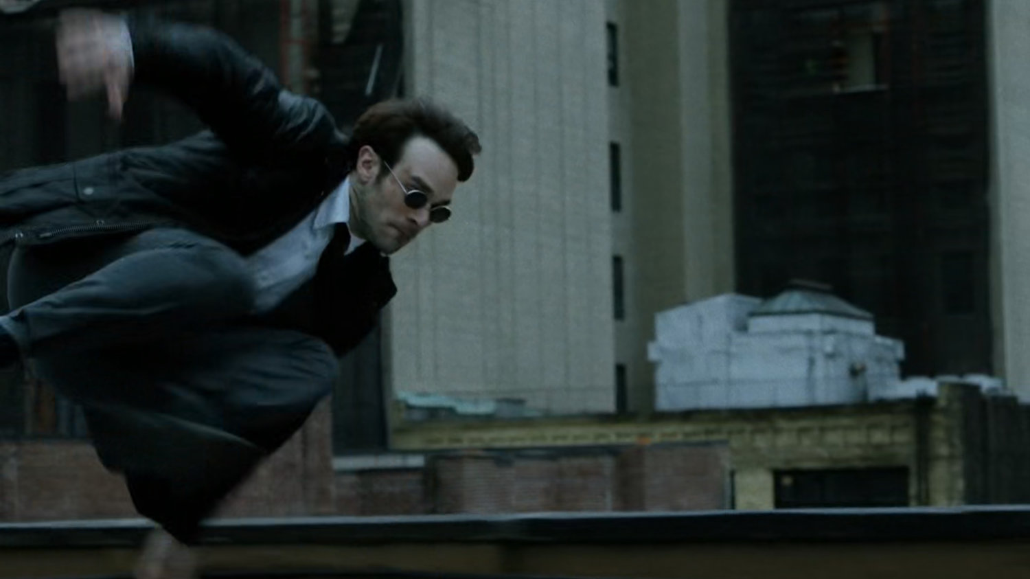 Matt runs across New York rooftop.