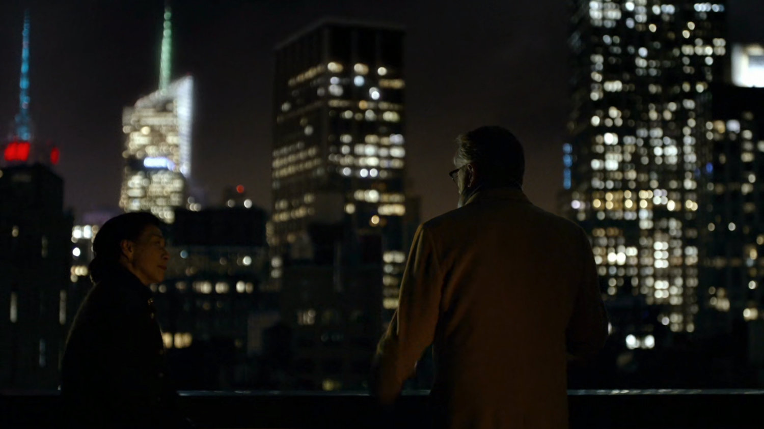 Madame Gao and Leland meet on a midtown rooftop.