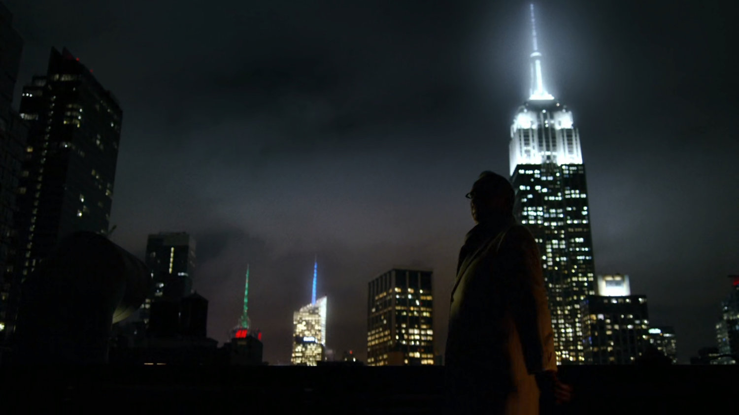 Madame Gao and Leland meet on a midtown rooftop.