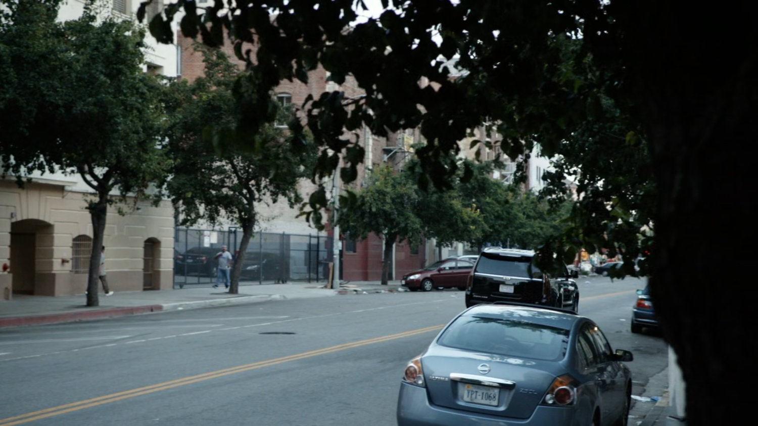 SUV drives along Washington DC street.