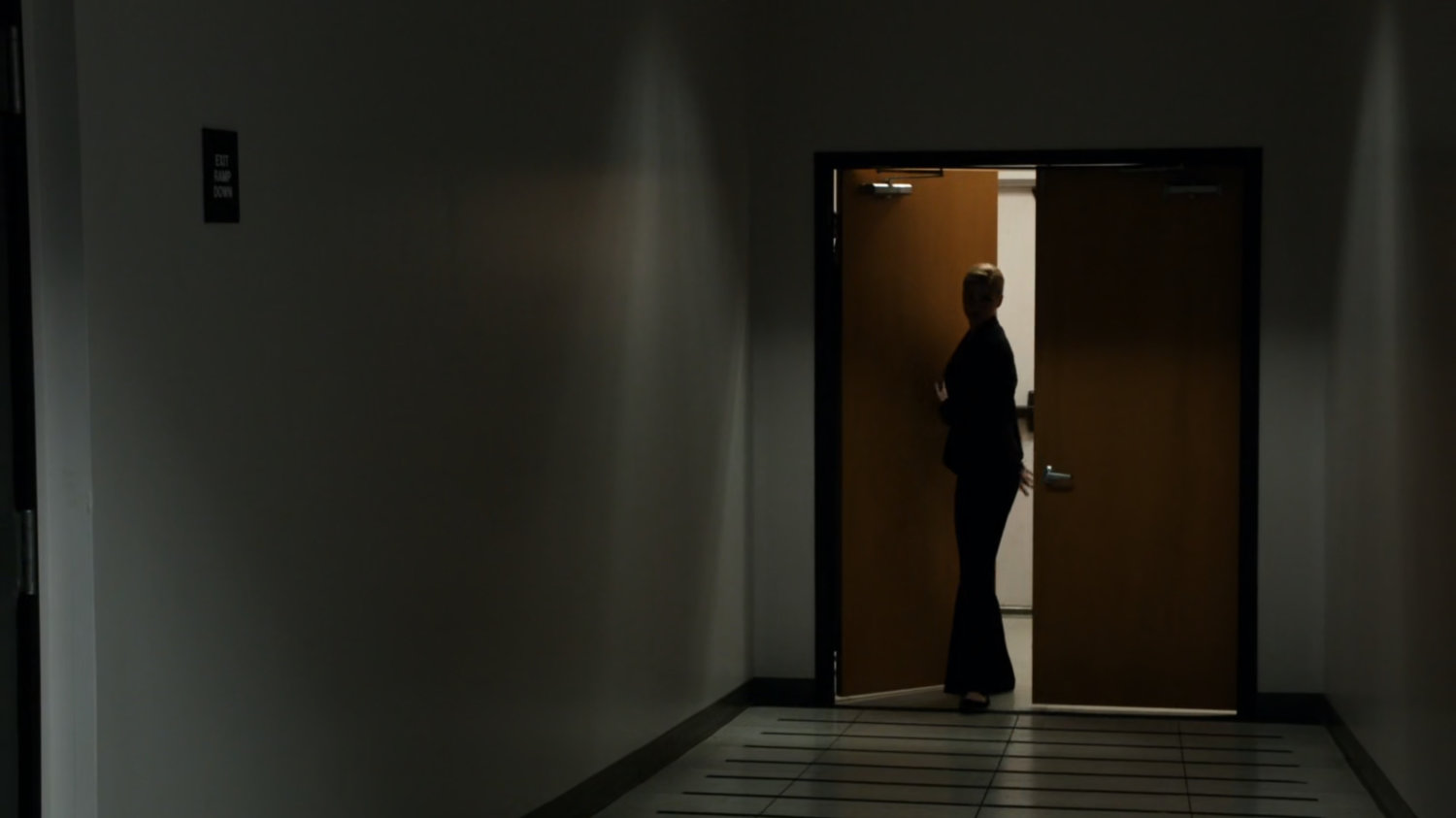 Bobbi entering an ATCU hallway.